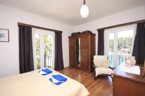 Postel nebo postele na pokoji v ubytování Villa Korčula