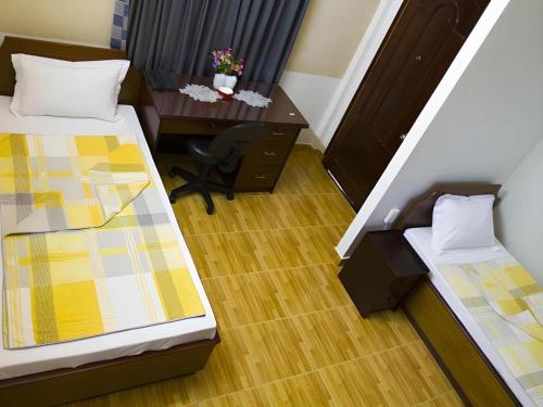Кровать или кровати в номере Spring Hotel