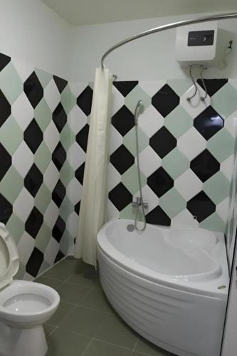 Ванная комната в Spring Hotel