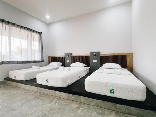 Ένα ή περισσότερα κρεβάτια σε δωμάτιο στο Amal Zone Villa