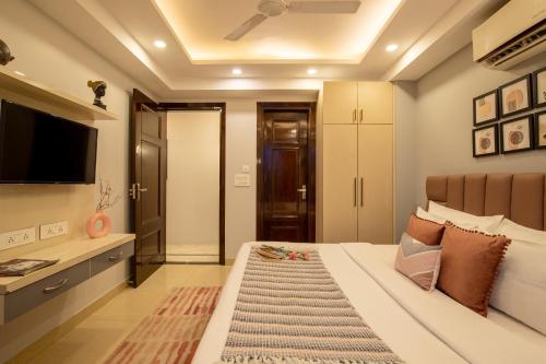 Voodi või voodid majutusasutuse BedChambers Medicity Serviced Apartments in Gurgaon toas