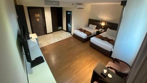 an aerial view of a hotel room with two beds at The BCC Hotel & Residence in Nagoya