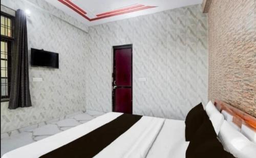 Postel nebo postele na pokoji v ubytování Hotel Cloud Inn