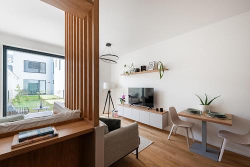 Posezení v ubytování Olive Garden Apartment with Garage