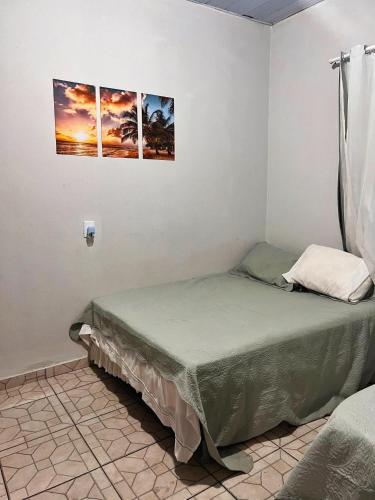 Postel nebo postele na pokoji v ubytování Cantinho do Sossego