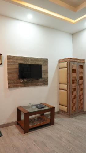 TV a/nebo společenská místnost v ubytování Park Hotel Gilgit
