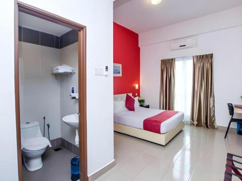 Katil atau katil-katil dalam bilik di Hotel Kobemas Melaka