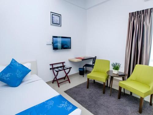 Katil atau katil-katil dalam bilik di Hotel Kobemas Melaka