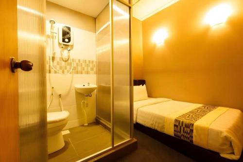 Koupelna v ubytování RAINFOREST Budget Stay