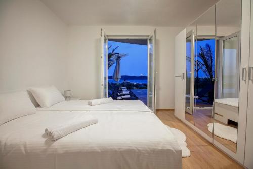 Uma cama ou camas num quarto em Villa Pia Split