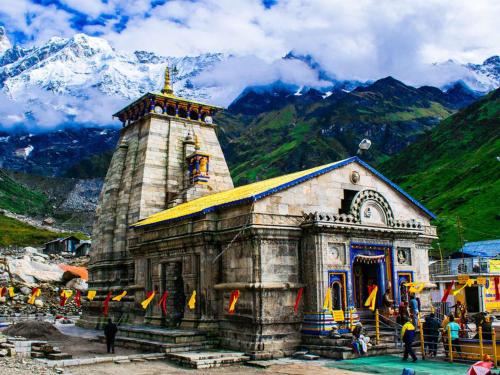 a group of people standing in front of a church at LA Riqueza Sushanti Retreat - Mountain View Rooms with Balcony # Pure Veg Restaurant # Jain Food Available # Parking # Customer's choice Hotel in Gupta Kāshi