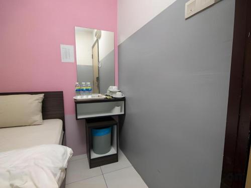 Katil atau katil-katil dalam bilik di Hotel CheckedInn