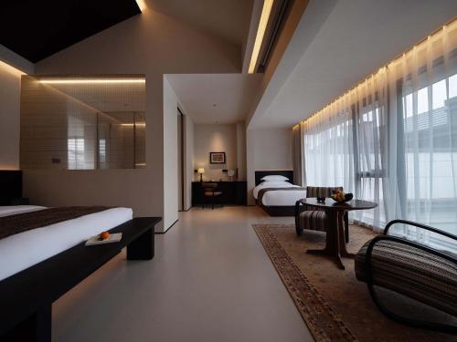 Posezení v ubytování Qi Yi Nanxu Pavilion Homestay
