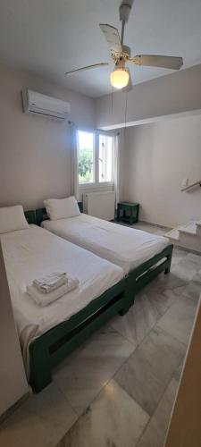 Una cama o camas en una habitación de Galatea