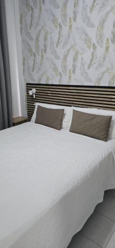 Apartamentos Playa Bajondillo 2房間的床