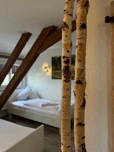 Кровать или кровати в номере Hotel Hasen Kaufbeuren Allgäu