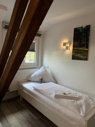 Кровать или кровати в номере Hotel Hasen Kaufbeuren Allgäu