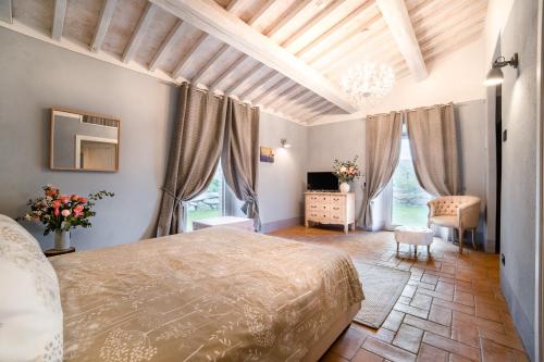 Katil atau katil-katil dalam bilik di Podere Val D'Orcia - Tuscany Equestrian