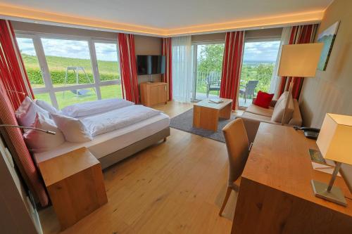 Postel nebo postele na pokoji v ubytování Hotel Rebenhof
