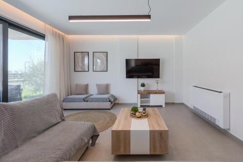 Μια τηλεόραση ή/και κέντρο ψυχαγωγίας στο Aether group villas