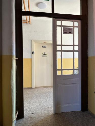 an open door in an empty room with a door sidx sidx at Apartma Pri Kosu in Slovenska Bistrica