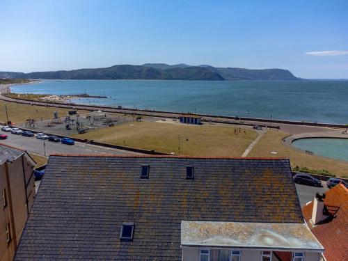 a view of the ocean from a building at Plas Gorwelion guest house - Adult only in Llandudno