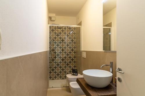 Ένα μπάνιο στο Appartamenti del Borgo