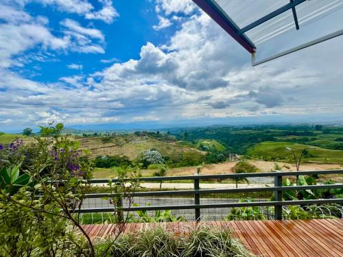 a view from the balcony of a house at La Puesta Del Sol in Filandia