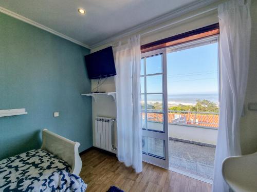 Postel nebo postele na pokoji v ubytování Vila Lucia