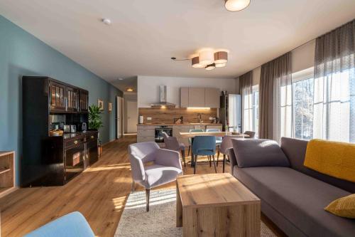 Posezení v ubytování SINGULAR - Mountainview Apartments
