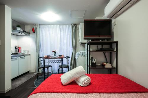 Ένα ή περισσότερα κρεβάτια σε δωμάτιο στο North Cottage Studio Apartment with private entrance