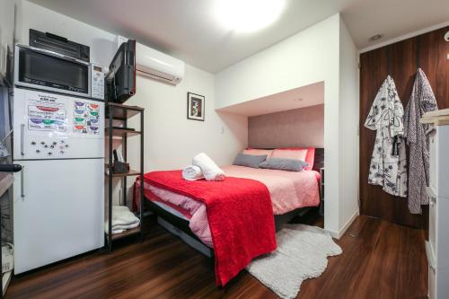 Ένα ή περισσότερα κρεβάτια σε δωμάτιο στο North Cottage Studio Apartment with private entrance