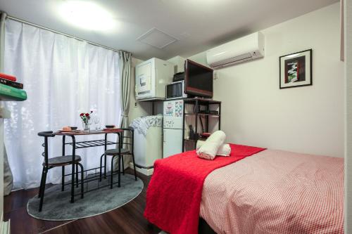 Ένα ή περισσότερα κρεβάτια σε δωμάτιο στο North Cottage Studio Apartment with private entrance