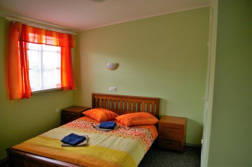 Postel nebo postele na pokoji v ubytování Kagu Hostel