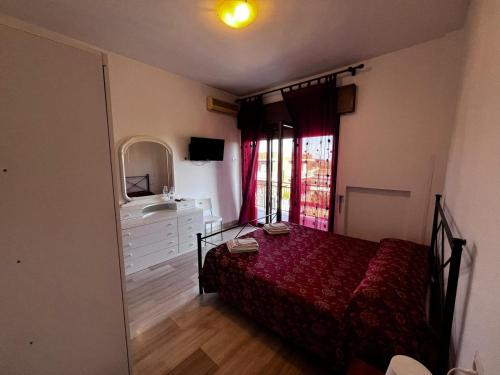 Postel nebo postele na pokoji v ubytování Abbraccio Apart