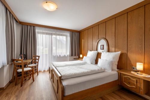 Postel nebo postele na pokoji v ubytování Gästehaus Berta