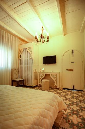 Postel nebo postele na pokoji v ubytování Gîte Feki