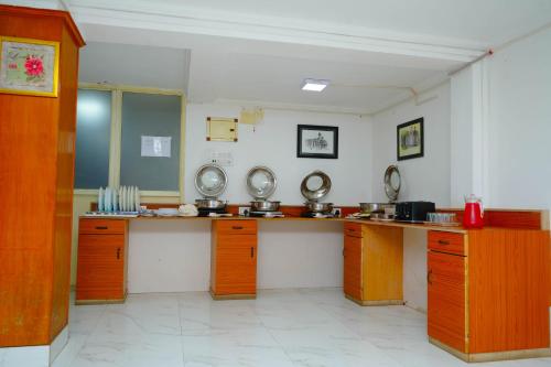 Kuchyň nebo kuchyňský kout v ubytování Nortels Heights Hotel Apartments