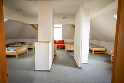 a room with two beds and a room with two beds at Chata pod Radhoštěm in Trojanovice