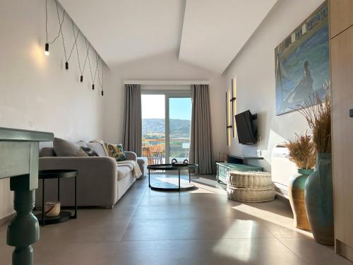 Χώρος καθιστικού στο Aura Suites