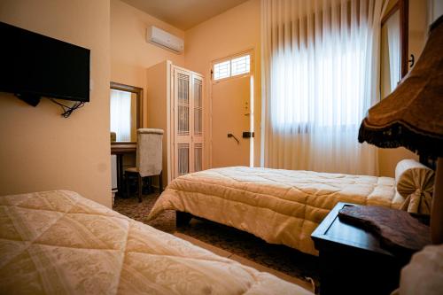 Postel nebo postele na pokoji v ubytování Gîte Feki