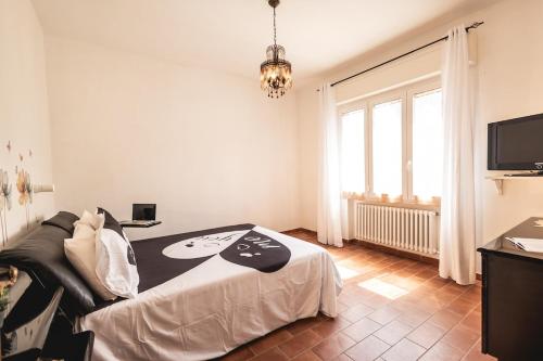 En eller flere senge i et værelse på Vintage Sea Apartment