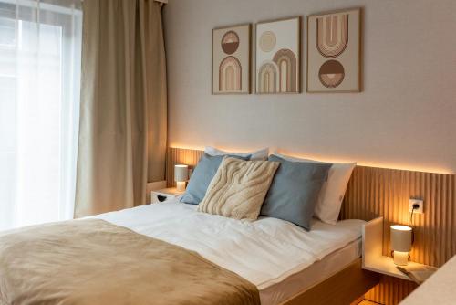 Ένα ή περισσότερα κρεβάτια σε δωμάτιο στο Iron Apartments