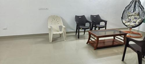 Posezení v ubytování PADSARO - ROSE of SHARON at ECR, Chennai