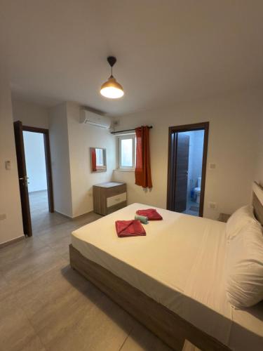 Postel nebo postele na pokoji v ubytování 1-Bedroom Apartment in Pietà P12A