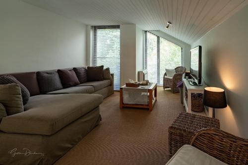 Guest house Huize De Witにあるシーティングエリア