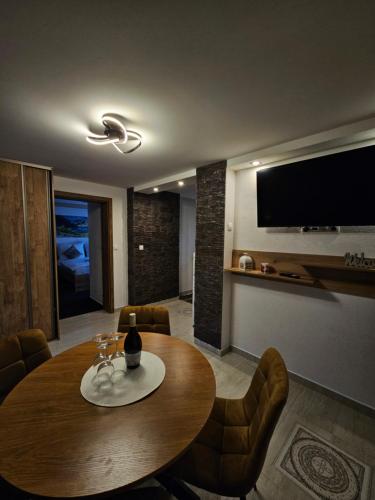 TV a/nebo společenská místnost v ubytování Apartmány ANJA