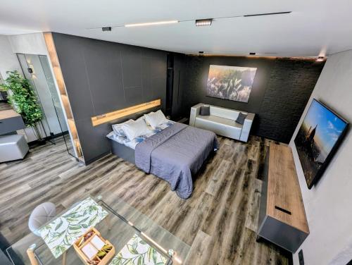 Cama o camas de una habitación en Апартаменты на Тохтарова