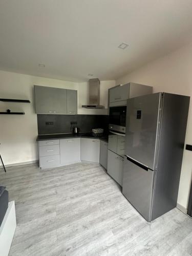 Una cocina o kitchenette en Penzion Fortuna Žatec