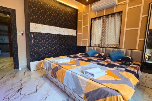 a bedroom with a large bed in a room at Lux Pvt Pool, Rain Dance, Near Bhimashankar, Pets! in Manchar
